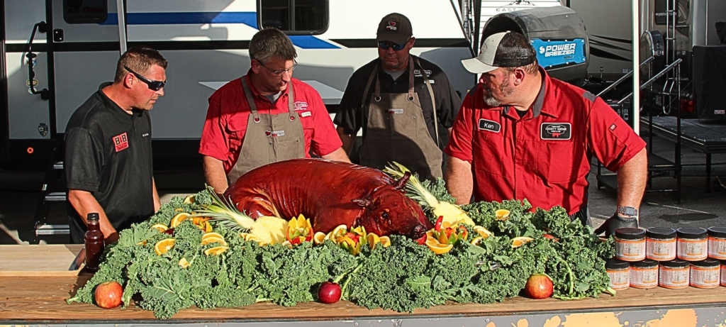 Whole hog decorated with fruits and vegetables