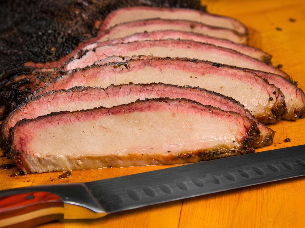 SLiced brisket and a slicing knife