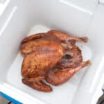 Cooler with a cooked turkey inside