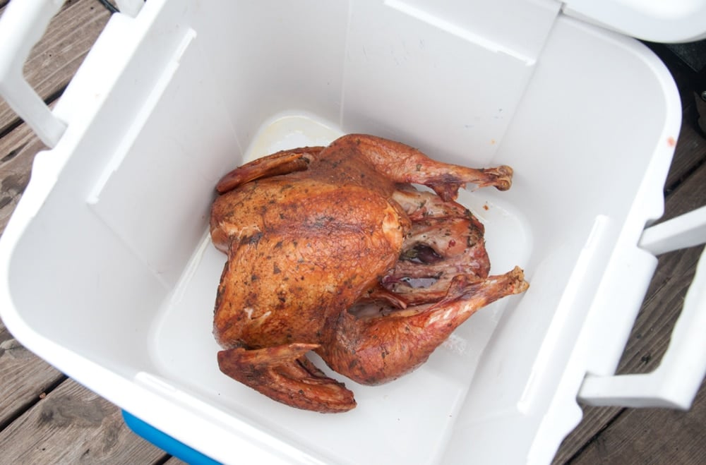 Cooler with a cooked turkey inside