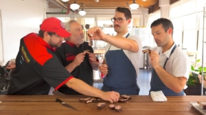 Four men trying indoor ribs recipe.
