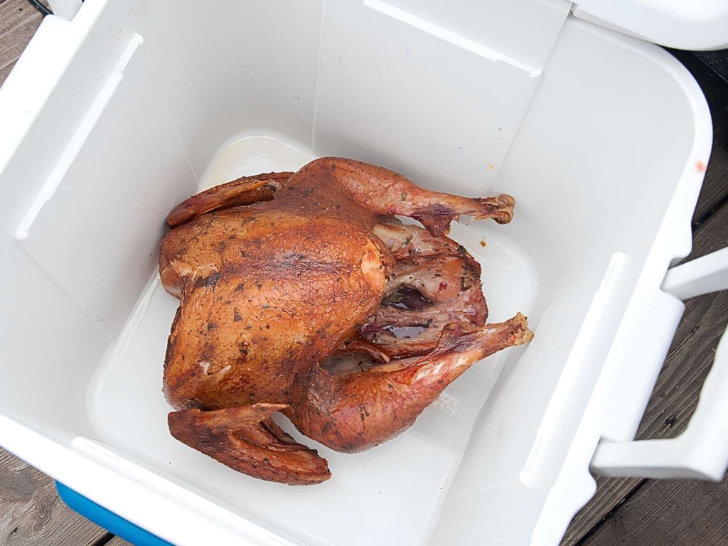 Cooler with a cooked turkey inside