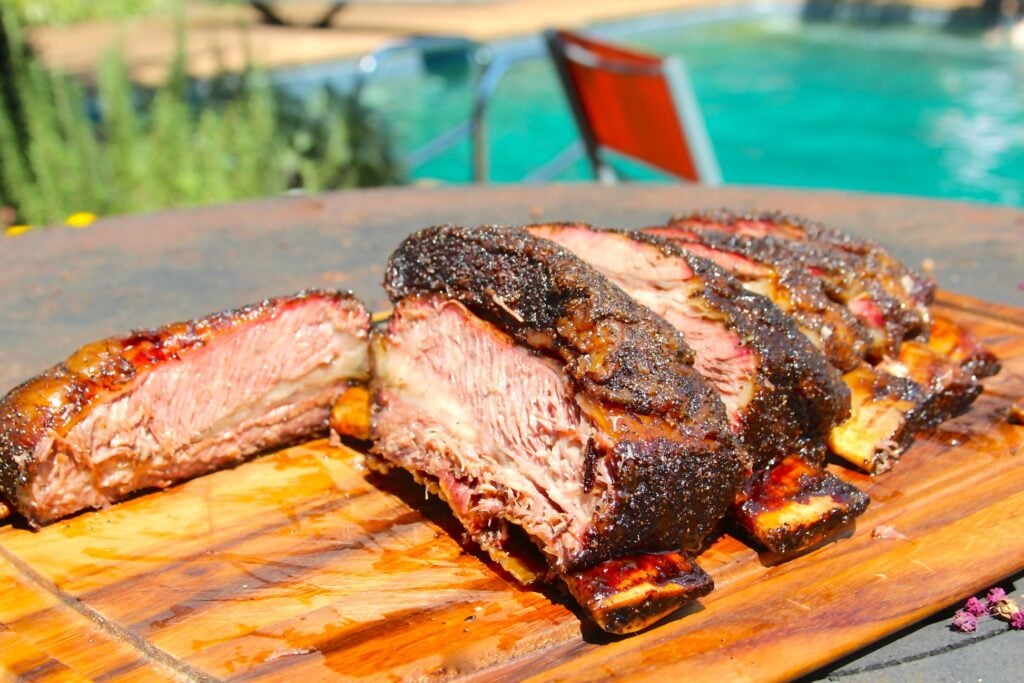 Sliced beef ribs on a cutting board