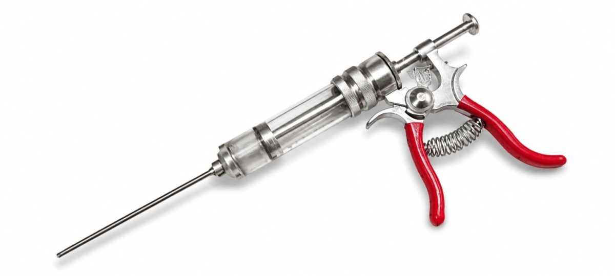 Meat injector for injecting brisket with beef broth.