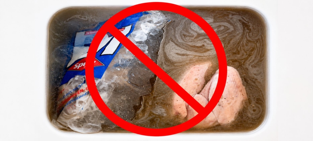 Poutry in a brining liquid with a bag of ice.