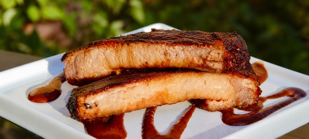 Sous vide and smoked ribs sliced and plated