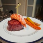 Plated smoked filet mignon with butter poached lobster tail