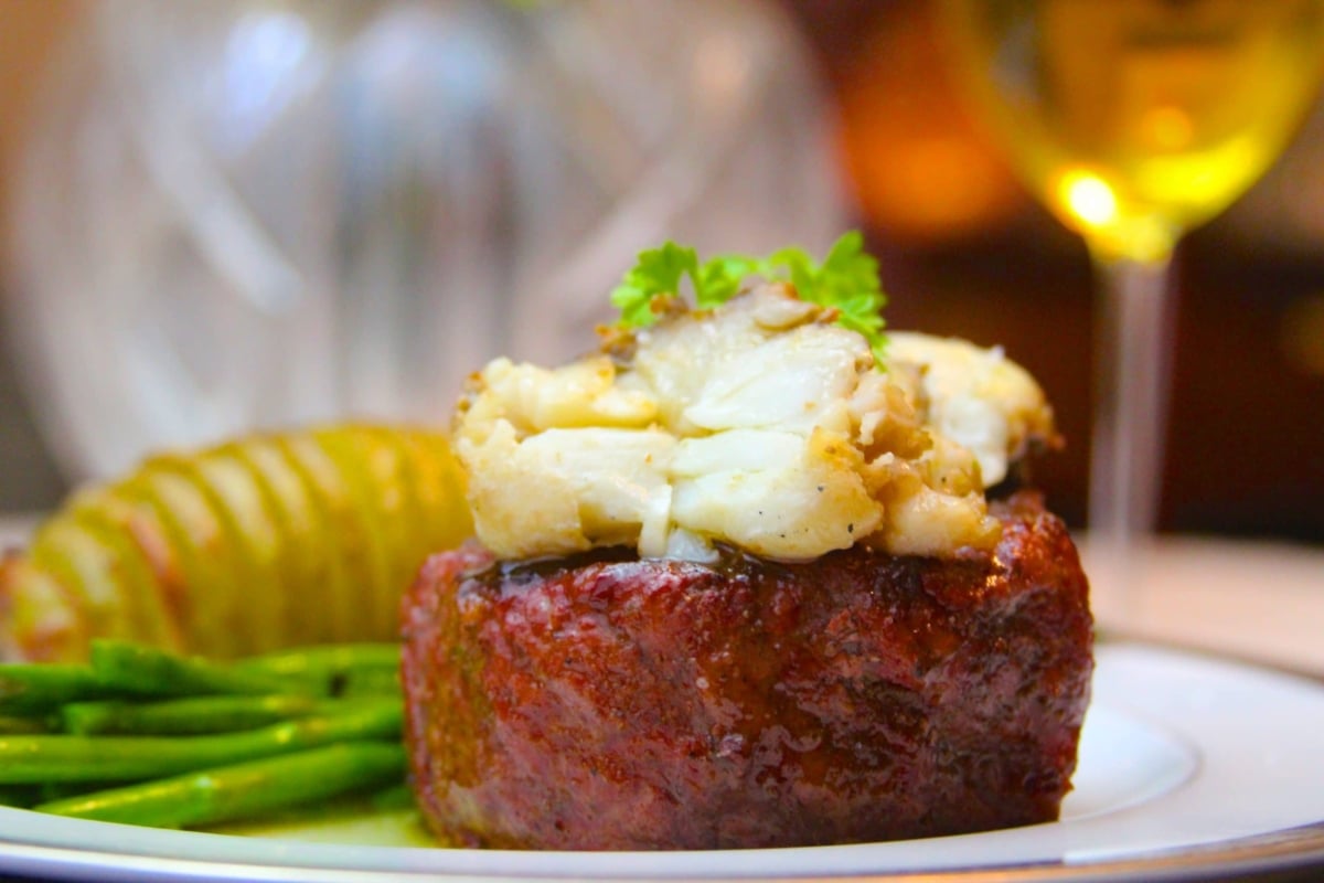 Plated smoked filet mignon with butter poached lobster tail