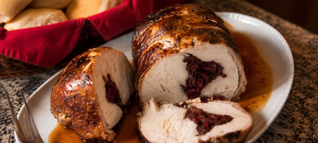 Sliced and plated smoked turketta.