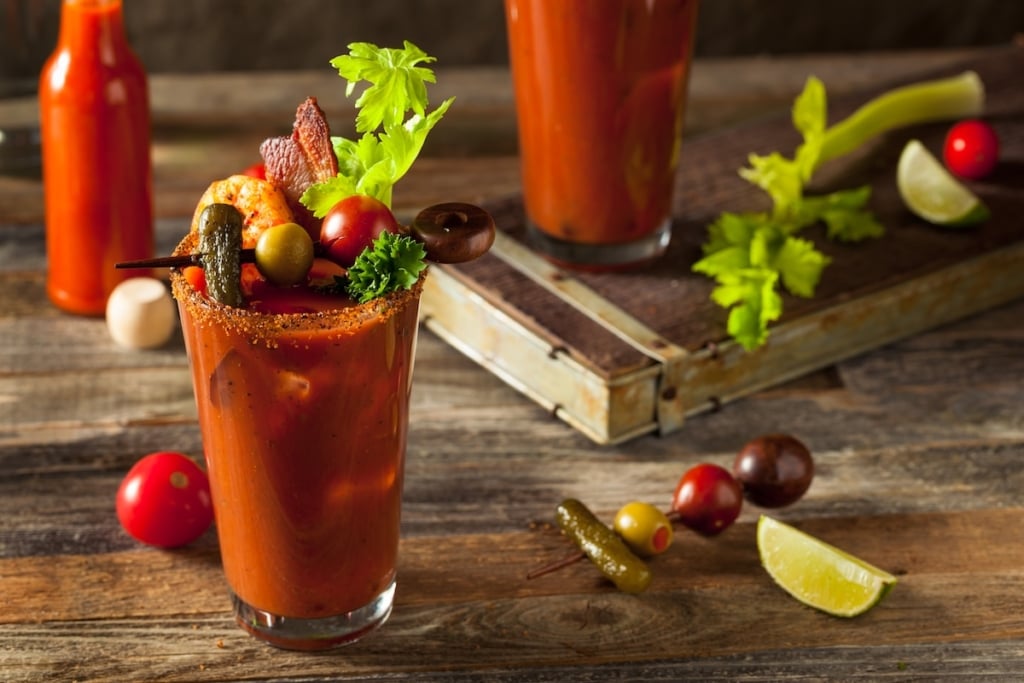 smoked bloody mary with bacon and celery stick
