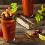 smoked bloody mary with bacon and celery stick
