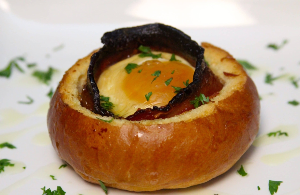 Candied bacon and egg breakfast bread bowl