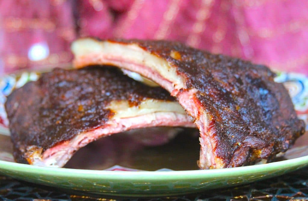 Smoked dry rubbed lamb ribs plated