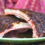 Smoked dry rubbed lamb ribs plated