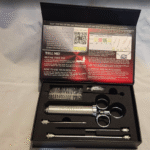 Premiala injector and parts in an open box