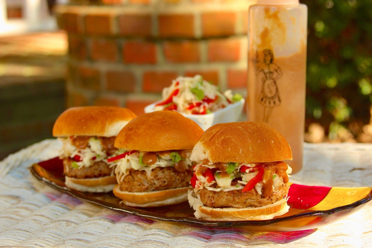 Pork satay burger sliders on a tray