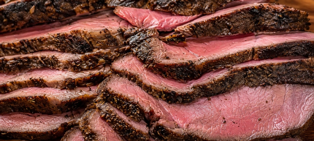 Slices of medium rare prime rib roast.