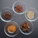 five spices in five containers