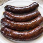 Grilled andouille sausage on a plate
