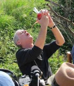 Anthony Bourdain drinking from a porron.