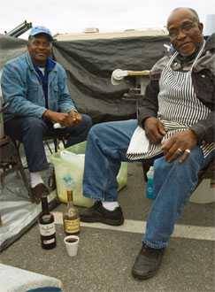 Two pitmasters resting before the competition