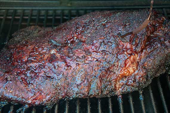 Smoked beef brisket on a grill