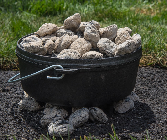 cast iron Dutch oven and coals