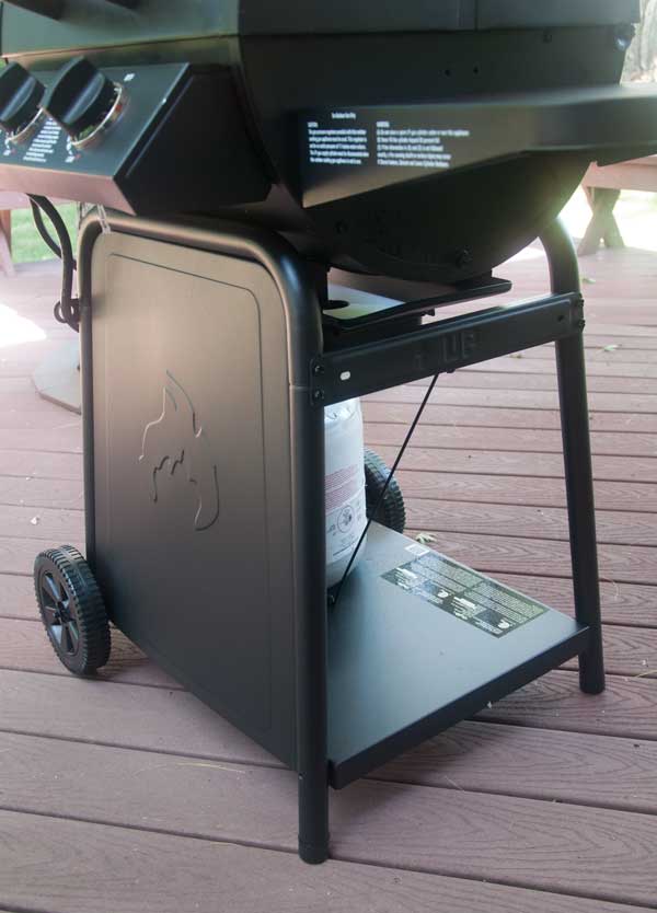 gas grill bottom cart on an outdoor deck