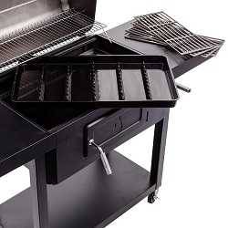 Black rectangular charcoal grill from above with lid up showing a rectangular black tray with six segments separated by metal ridges.