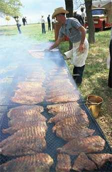 Ribs being cooked on the pit, Latin American Ambassadors' Weekend, 4/1/1967, by Yoichi R. Okamoto, with permission of the LBJ Library & Museum.