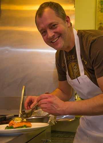 Paul Virant plating a grilled salmon salad