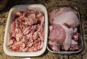 gravy pan with turkey carcass