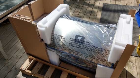 Shiney horizontal barrel packed in white foam and heavy cardboard