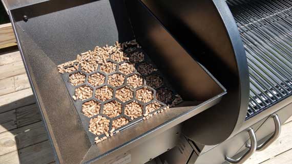 Metal box filled with wood pellets.