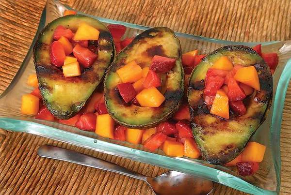 Plated grilled avocados with fruit salsa