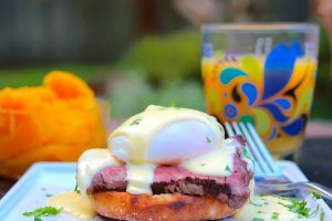 Grilled steak and eggs plated