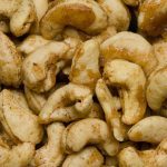 A pile of lightly glazed cashew nuts