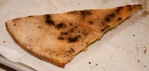 bottom of Pepe's pizza crust