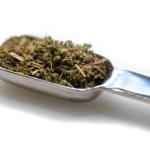 Poultry dry rub seasoning in a measuring spoon