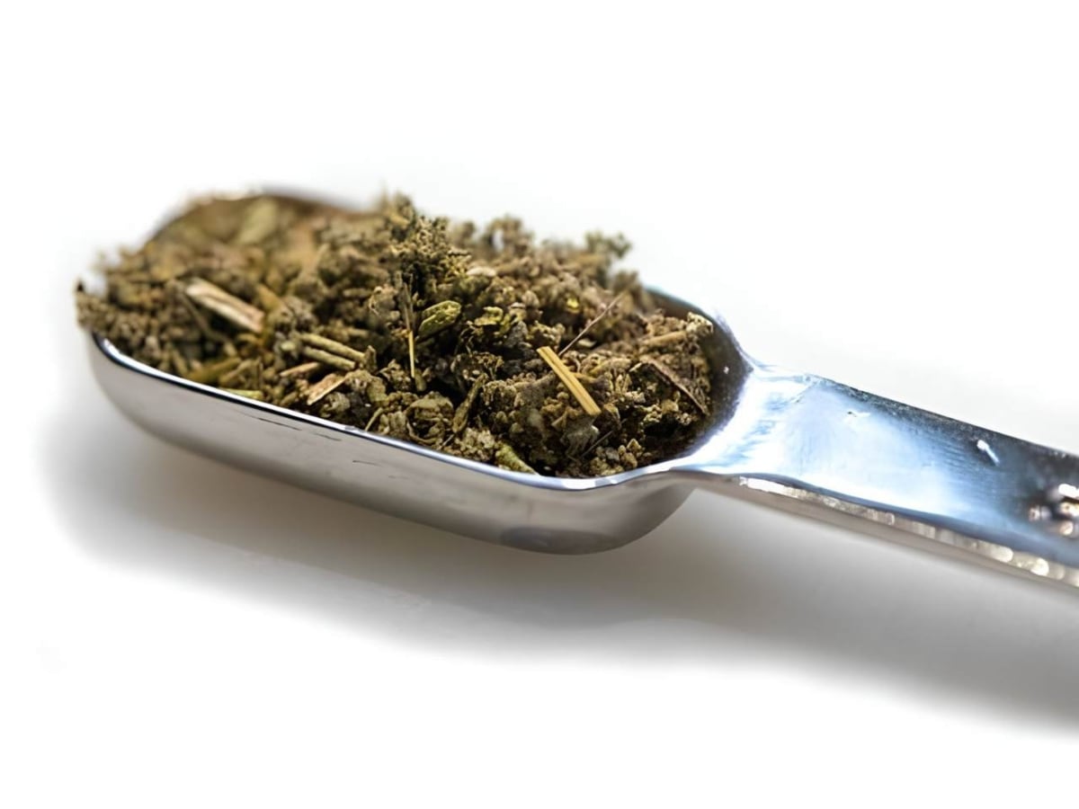 Poultry dry rub seasoning in a measuring spoon