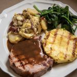 Grilled ham steak topped with redeye gravy