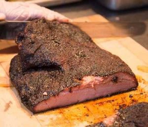 Removing fat from a cooked brisket