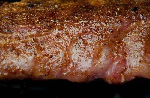 BBQ dry rub on a rack of ribs