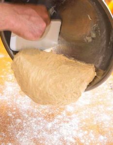 scraping dough