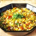 Big bowl of corn and red peppers make a salad