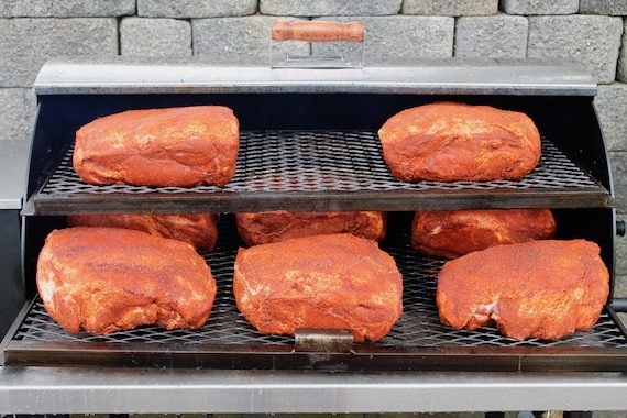 smoked pork butts on grill