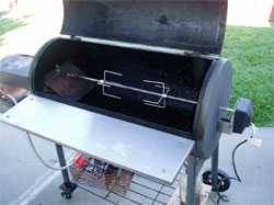 additions of a rotisserie and work table on an offset smoker