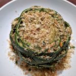 Cooked artichoke with breadcrumb topping