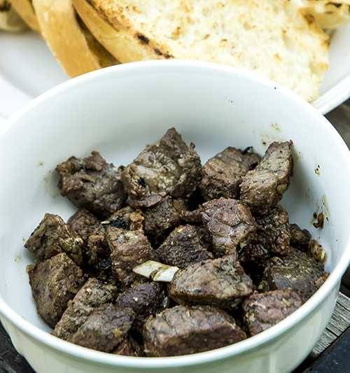 Cooked beef tenderloin chunks in a bowl