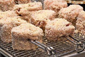 Breadcrumb coated skewered chicken pinwheels